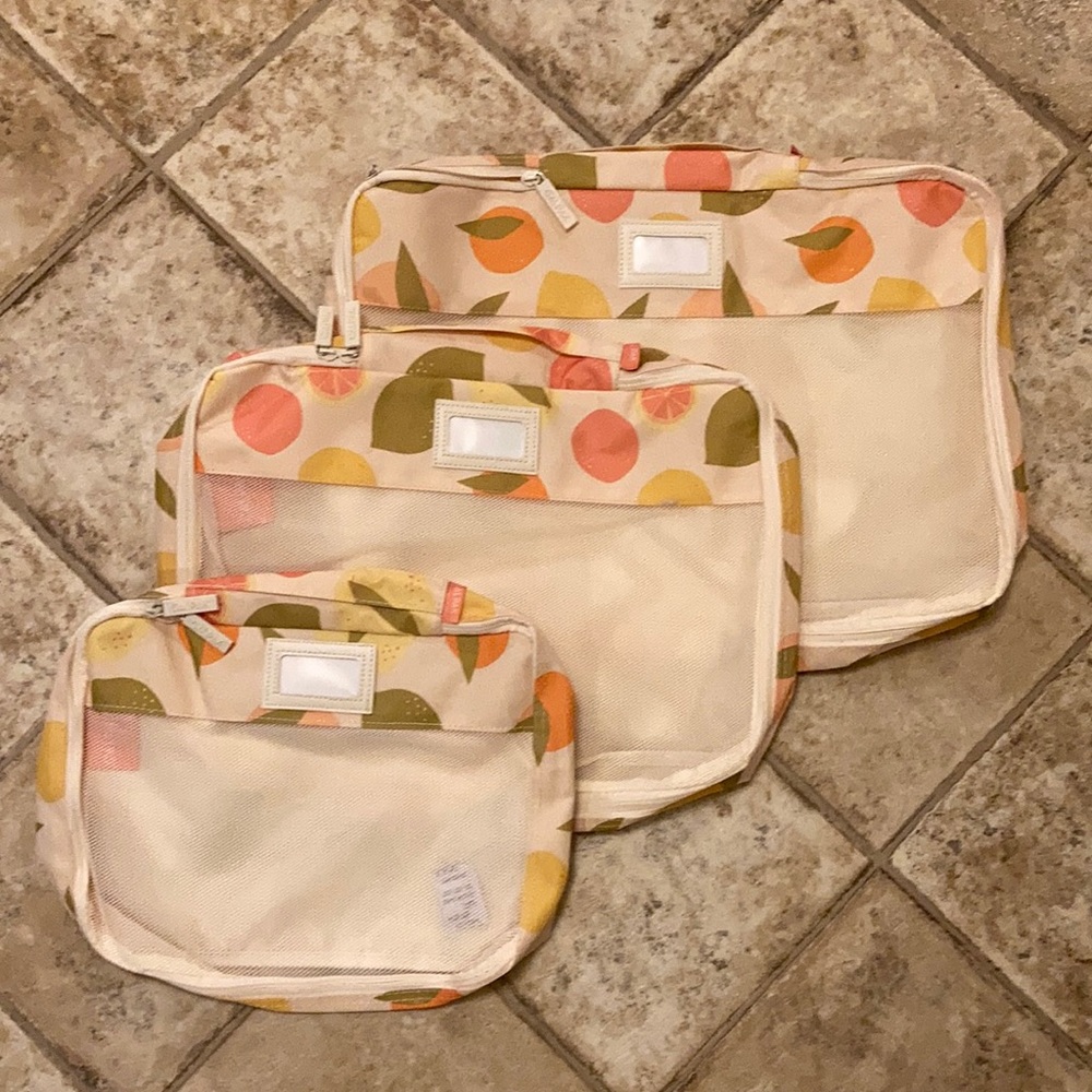 Brand new! Set of 3 Calpak packing cubes.